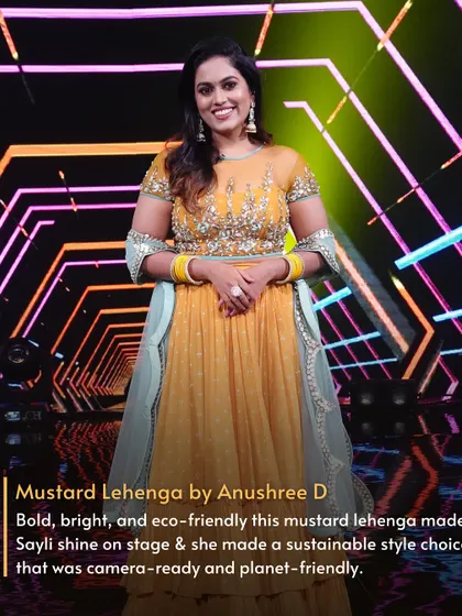 Bold, bright, and eco-friendly. This mustard lehenga by Anushree D made Sayli Kamble shine on stage, a perfect example of a camera-ready and planet-friendly style choice.