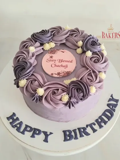 A gorgeous no-fondant cake for Chachaji's 80th birthday. The beautiful purple rosette piping gives it a classic and elegant look, perfect for celebrating such a momentous occasion.