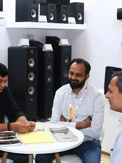 Our team engages with potential partners and clients at our Smart Home Expo booth. We believe in building relationships through detailed consultation and a shared passion for audio-visual excellence.