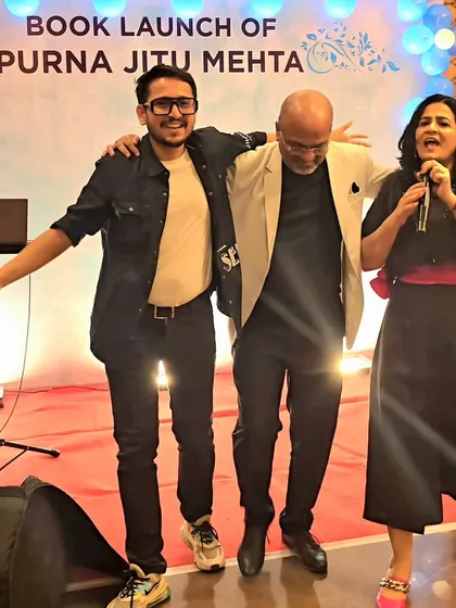 Sharing a fun moment on stage with the event organizers. I believe in building a great rapport with my clients and their guests to ensure a seamless and enjoyable event.