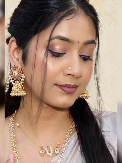 A close-up of the Sankranti eye makeup, featuring soft pink and lilac shimmers.