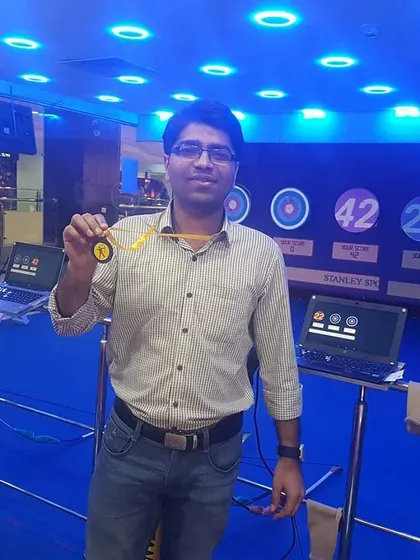 Another satisfied archer showing off his medal. Our facility is equipped with everything you need to practice and succeed.