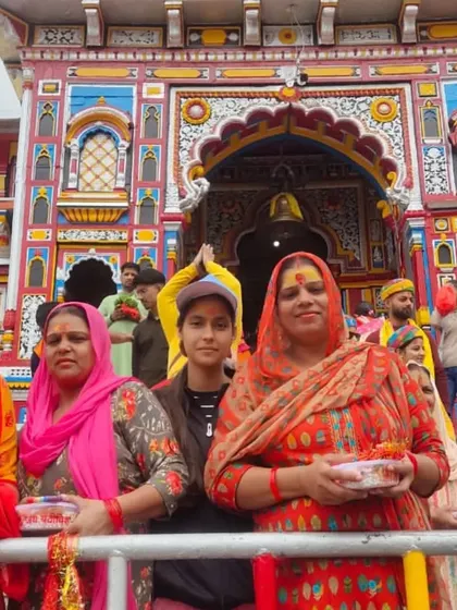 **Smiles of Faith.** A close-up of some of our women travelers, their faces filled with devotion and happiness at the Badrinath temple.