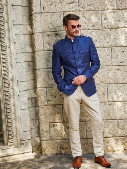 Fashion is about dreaming and making other people dream. This cobalt blue jacket paired with khaki breeches is a look that is sure to inspire.