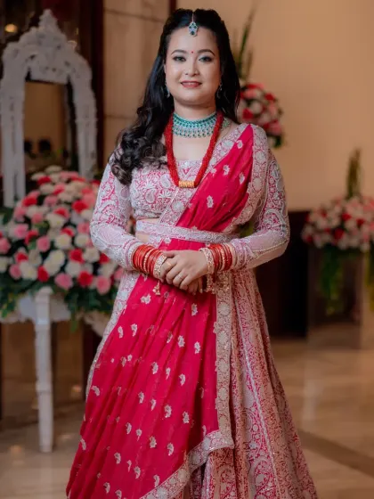 My glowing Nepali bride in a beautiful pink and red lehenga. I used shimmer on her eyes to make them pop and kept the rest of the makeup soft and clean.