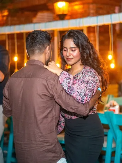 A sensual Bachata move. The focus and connection are intense.