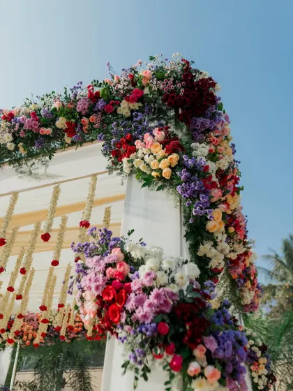 The corner of a floral mandap, showing the sheer density and variety of colorful flowers we use to create our grand structures.