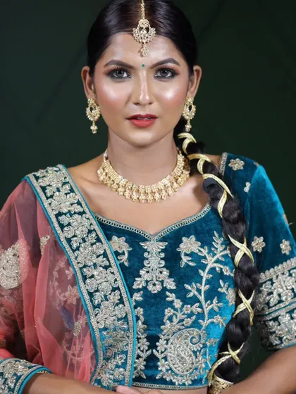 A direct portrait showing the flawless base and soft smokey eye.