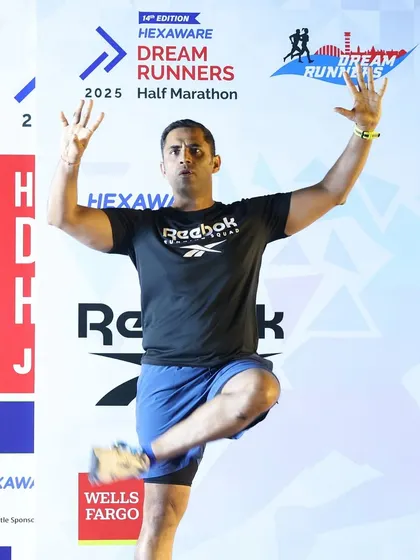 Another dynamic stretch demonstrated on stage. My goal is to get every runner ready for the challenge ahead.