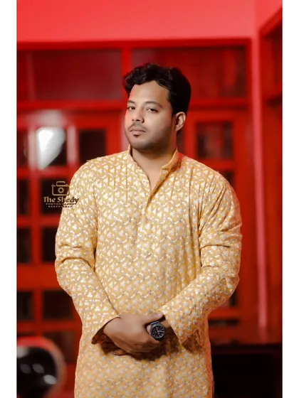 A stylish portrait of the groom, Advocate Saqib, at his Haldi ceremony. We use creative lighting to create a moody and sophisticated look.