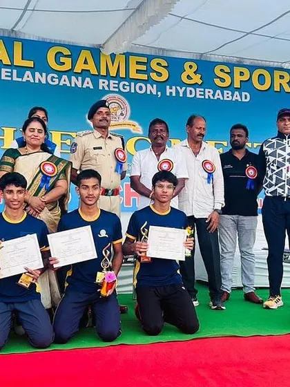 The boys' 4x400 relay team on the podium after securing a silver medal at the CISCE National Games.
