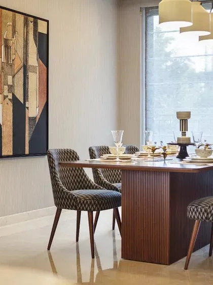 The dining area of the Max128 apartment, as featured in a media publication.