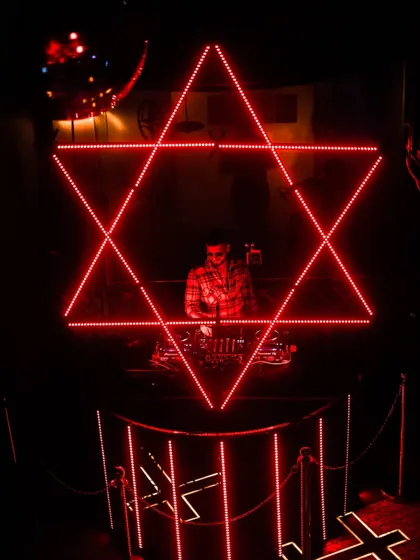 Framed by a star of David light installation, a unique visual from one of my gigs.