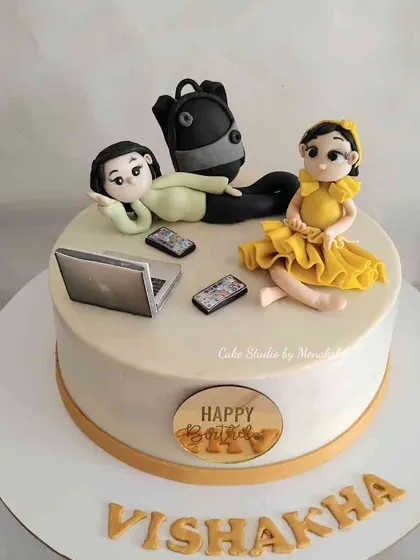 For Vishakha, who juggles work and motherhood. This cake shows her with her child, laptop, and phone, celebrating all the roles she plays.