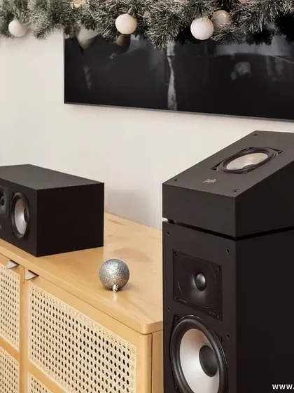 This Polk audio setup, featuring height modules for Dolby Atmos, is decorated for the holidays. It is ready to deliver an immersive sound experience that makes your festive celebrations even more magical.