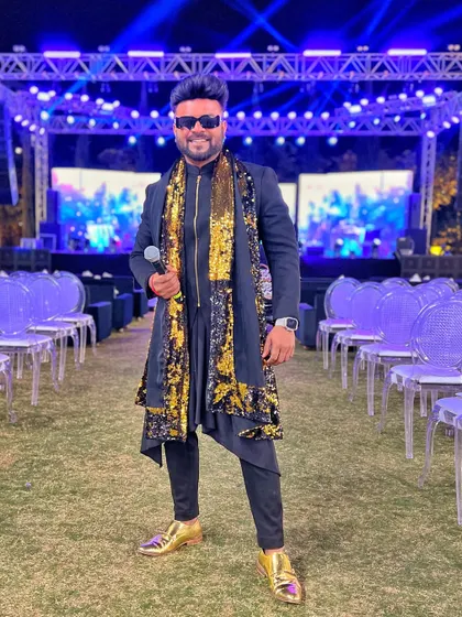 Ready for the stage in my black and gold ensemble.