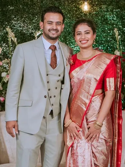 The newly engaged couple, Ivy and Vivek. They look so happy and elegant in front of the modern floral backdrop we created for them in Calicut.