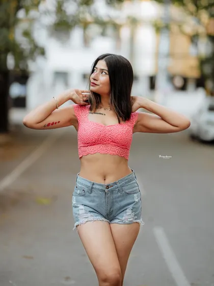 This image captures a spontaneous, happy moment during an outdoor shoot. I aim to capture genuine expressions that make the photos feel authentic and relatable.