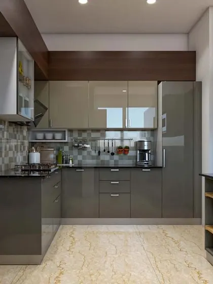 This L-shaped kitchen features glossy grey cabinets and a dark countertop. The marble-look floor and wood-paneled ceiling accent add warmth and texture to the modern design.