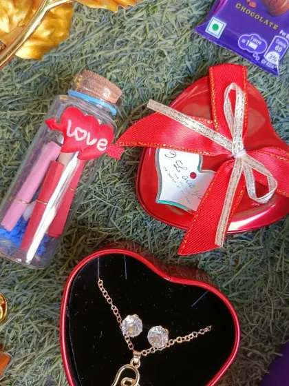 A close-up of the message bottle and the heart-shaped necklace box from our Valentine's combo.