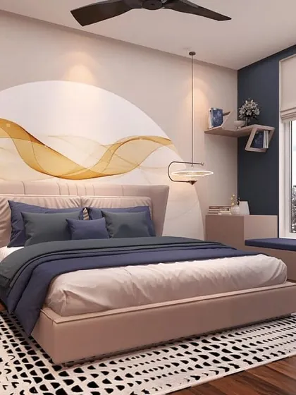 A bedroom from the 'Panchsheel Towers' project, featuring a stunning abstract wall mural behind the bed. The room has a cozy window seat and a sophisticated blue and beige color scheme.