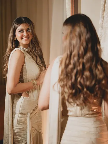 A tender moment between the couple. The bride's smile is radiant, and her makeup enhances her happiness without being overpowering.
