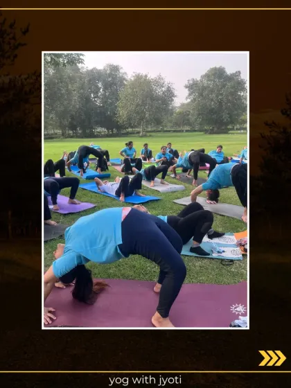 An outdoor class practicing Chakrasana (Wheel Pose), a powerful backbend that opens the heart and builds strength.