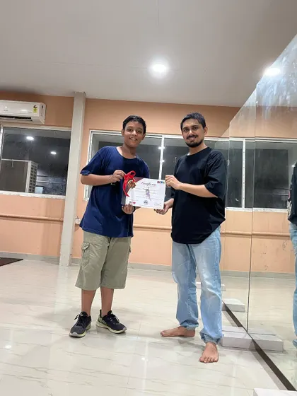 Students from my kids' batch receiving their certificates. I offer certification to validate the hard work and dedication they put into their training.