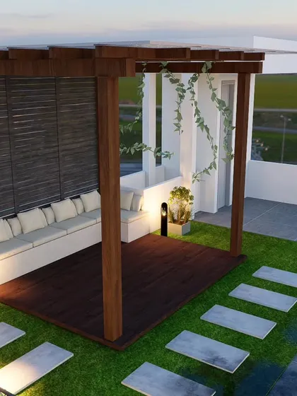 A concept design featuring a wooden pergola with a built-in sofa, surrounded by artificial grass and pathway lighting.