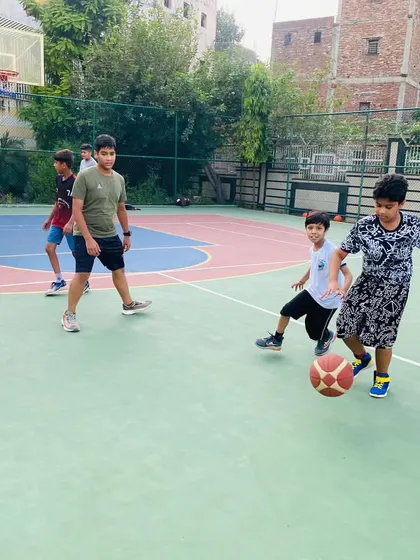 A young player learns to handle the ball under pressure.