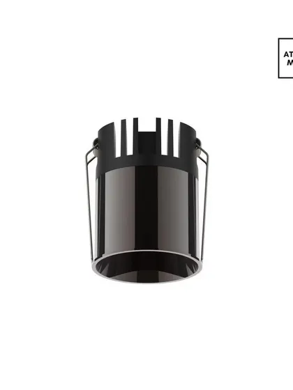 The Liquid Beam downlight in a plated gunmetal black finish. This choice creates a complete anti-glare effect, as the dark reflector absorbs stray light, resulting in a very comfortable and dramatic illumination.