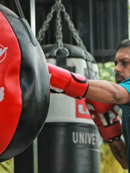 A fighter working on the slip bag. This piece of equipment is great for practicing head movement and defensive reflexes.