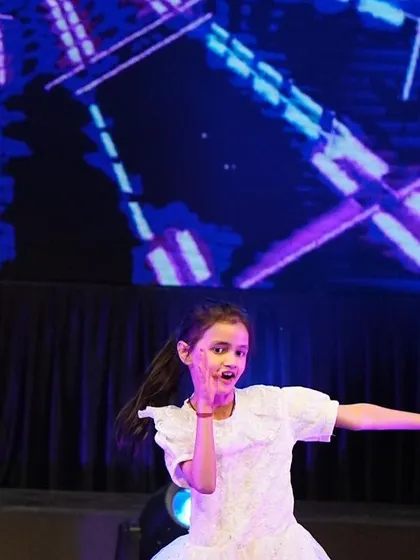 One of our youngest performers stealing the show with her perfect expression and confident pose.