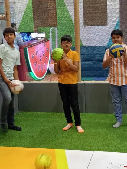 Getting ready for a game in our mini ball court. It's a great space for kids to practice their coordination and enjoy some friendly competition.