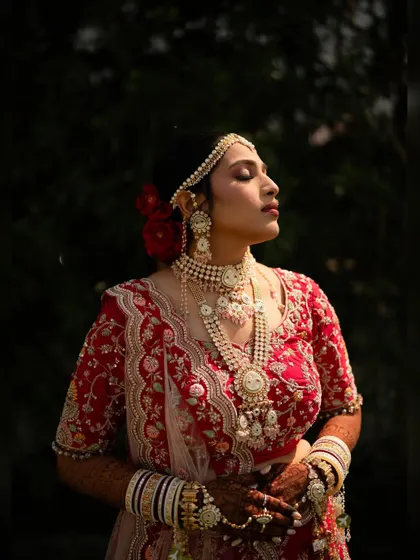 A sun-kissed shot of the bride, her skin glowing and her makeup looking absolutely radiant in the natural light.