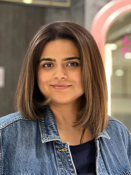 A beautiful, warm light brown color on a chic bob. This look is modern, stylish, and incredibly flattering.