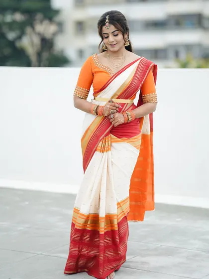 A full-length view showing how every element, including the henna, contributes to a graceful and complete look.