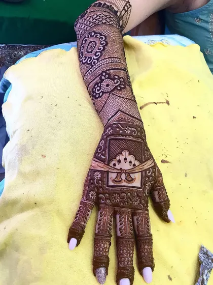 A close-up of a single hand, showing the detail and precision in every line and dot.