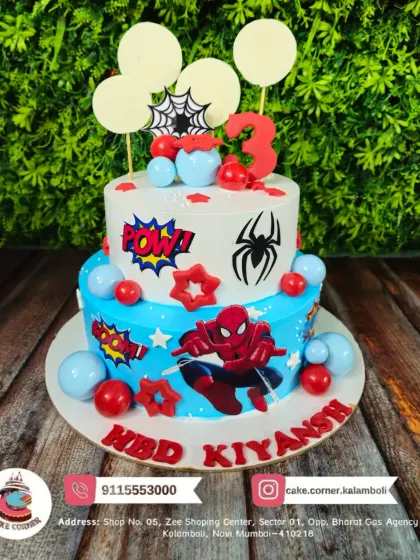 Swing into the party with this two-tier Spiderman cake. With comic book "POW!" signs and Spidey in action, it's a design that any Spiderman fan will love for their birthday.