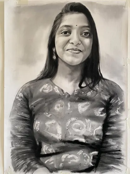 A dry brush portrait capturing a woman's warm and friendly smile.