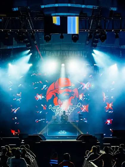 A wide shot of the Gully Fest stage under bright blue lights. This image captures the epic scale and high-quality production of the festival.