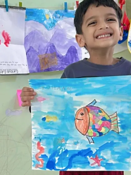 A duplicate of ID 54, this cheerful painting of a rainbow fish was inspired by a story read during our online session.