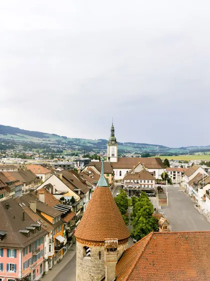 An establishing shot of the beautiful Swiss town where their story unfolded. The location is more than a backdrop; it's a part of the memory.