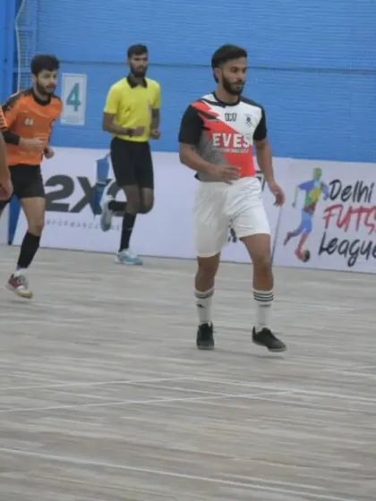 My players on the futsal court, demonstrating teamwork and movement in a confined space.