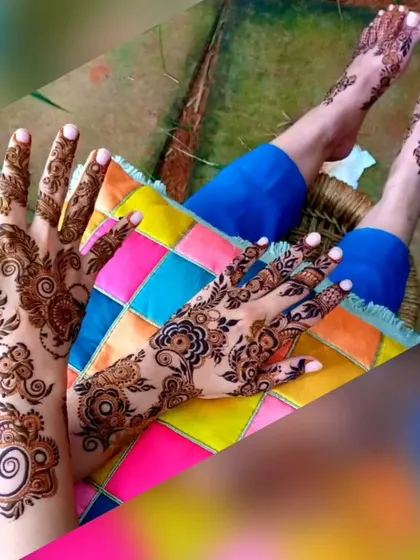 A lovely shot showing coordinated henna for both the hands and feet. The designs are modern and elegant, perfect for a bridesmaid or guest.