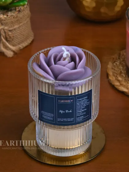 The 'After Dark' candle in a calming lavender shade. The scent is designed for slow evenings and moments of quiet reflection.