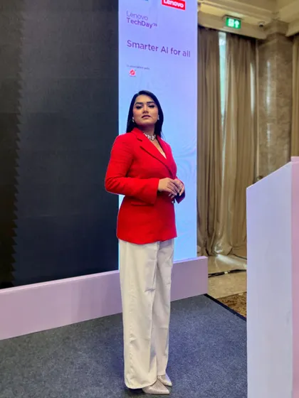 On stage at the Lenovo TechDay. My goal is to be a commanding yet approachable presence, making technology accessible to everyone in the audience.