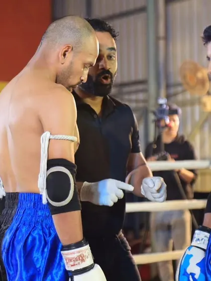 A moment between rounds. Clear instructions and cornering are key to winning a close fight.