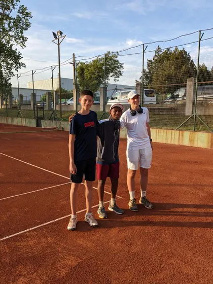 Making friends on the tour. The camaraderie built during these international trips is just as important as the on-court competition.