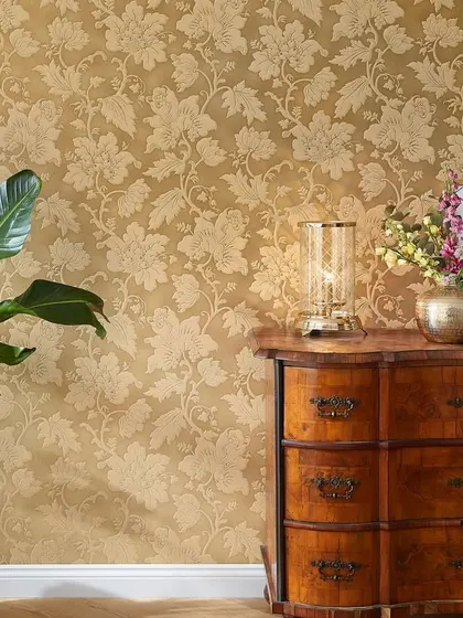 A rich, golden floral damask wallcovering that adds a touch of opulence and warmth. This design from the Trianon collection is perfect for creating a luxurious and traditional ambiance.